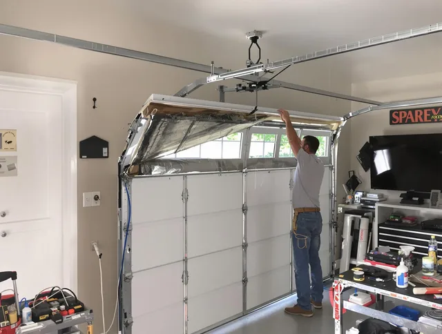 Garage door section replacement by Whitman Garage Door Repair in Whitman