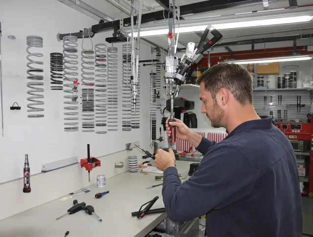 Whitman Garage Door Repair safety certified technician performing precision spring replacement in Whitman